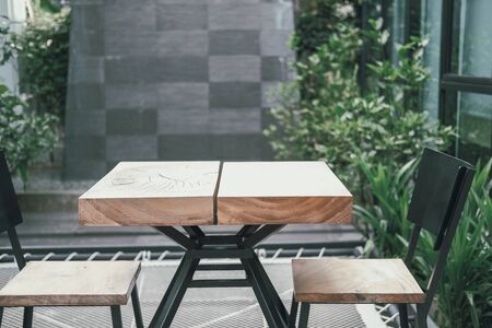 wooden table & chair in living room in garden. home interiorの写真素材