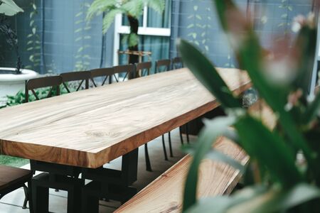 wooden table & chair in living room in garden. home interiorの写真素材