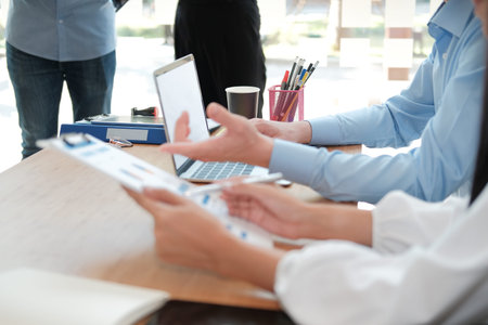 business people discussing on performance revenue in meeting. businessman working with co-worker...