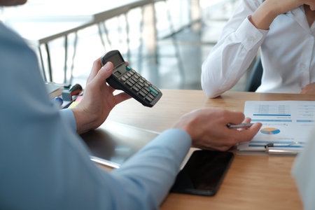 business people discussing on performance revenue in meeting. businessman working with co-worker...