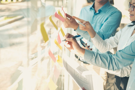 user experience UX designer designing web on smart phone layout. UI planning mobile application....