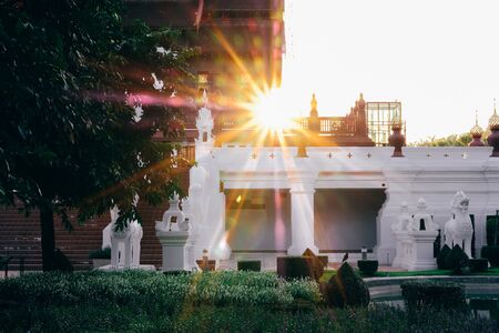 evening sunlight through Thai traditional buildingの写真素材