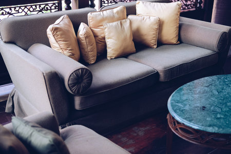 beige pillow on sofa couch in living room. home apartment interior