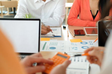 business people discussing on performance revenue in meeting. businessman working with co-worker...