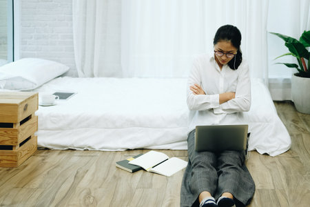 asian woman using computer. freelancer work remotely at home. leisure lifestyle