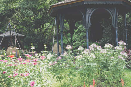 gazebo pavilion for resting in garden park. tranquil nature sceneの写真素材