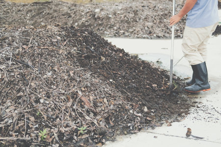 organic compost heap. fertilizer production for soil cultivation in agriculture industry