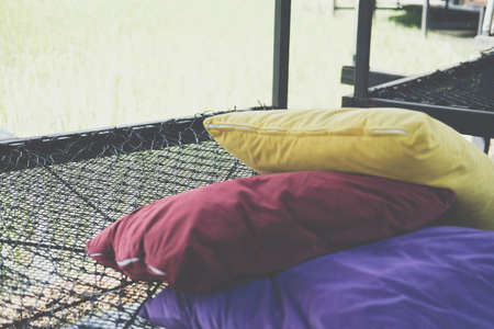 black thread rope net bed pillow for sleeping beside rice paddy fieldの写真素材