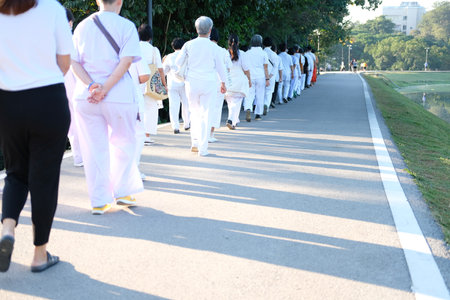 Chiang Mai, Thailand -  November 19, 2020: buddhist people walking for mindfulness meditation at Chiang Mai university in Chiang Mai, Thailand on November 19, 2020のeditorial素材