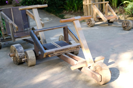wooden cart toy car for kids. traditional wagon of hill tribe in northern Thailandの写真素材