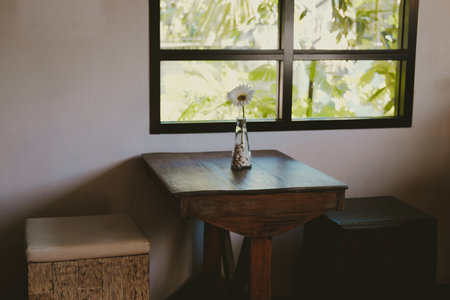 wooden chair stool with leather cushion in living room at homeの写真素材