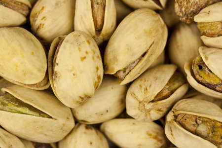 A close-up shot of pistachio nuts.  Great for a background or desktop.
