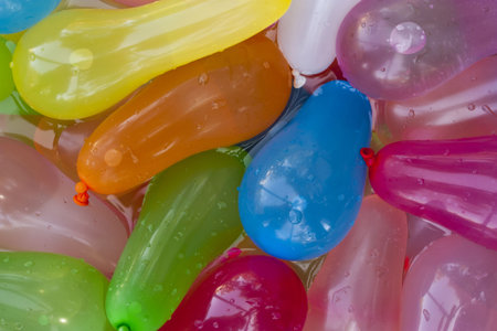 A bunch of water balloons in water