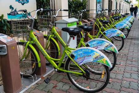 SHANGHAI, CHINA - APRIL, 2017: Green public bicycle in parking lot in Shanghaiのeditorial素材