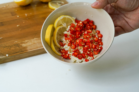 Thai spicy salad ingredient, chili, garlic and lemonの写真素材