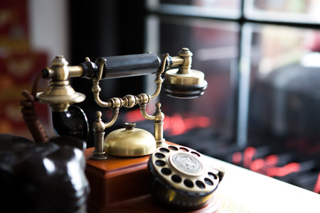 Black gold antique vintage telephone, abstract of communicationの写真素材
