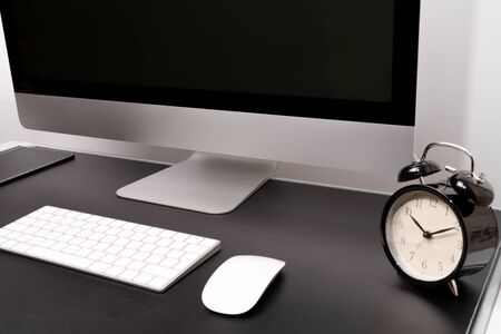 retina display with keyboard, mouse and alarm clockの写真素材