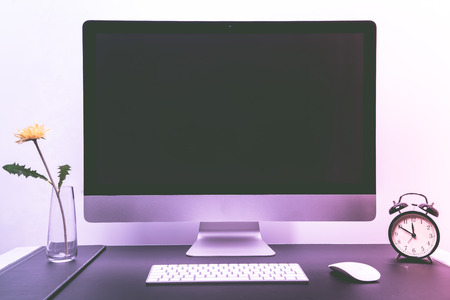 retina display with keyboard, mouse, alarm clock and with and purple carnation - apply filterの写真素材