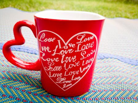 Love in heart, red cup of coffeeの写真素材