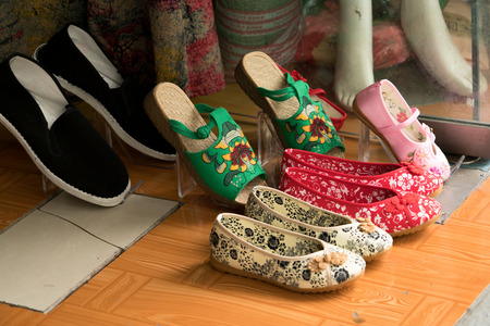 colorful of chinese shoes in store, old chinese shoes styleの写真素材