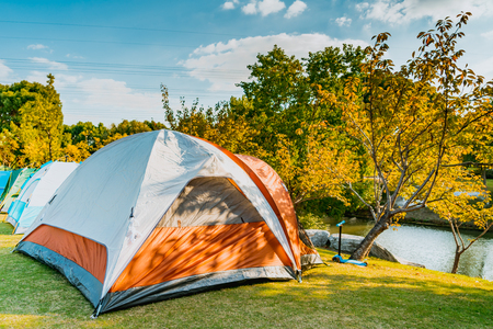 camping and tent riverside on the sunny day, relax and lifestyleの写真素材