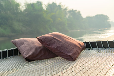 two pillow on the net at the rafting cottage terrace in the moring sunrise