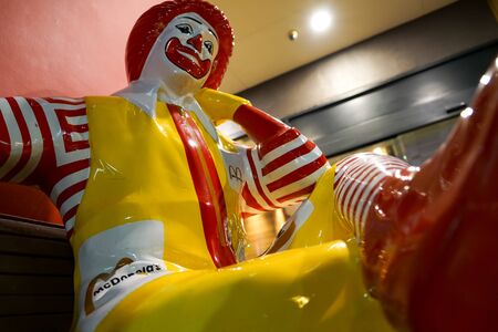 NAKHON PATHOM, THAILAND - FEB, 2018 :  Portrait of Ronald McDonald sitting in front of McDonald's restaurantのeditorial素材