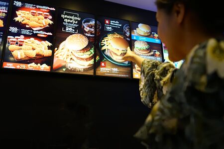 NAKHON PATHOM, THAILAND - FEB, 2018 :  the McDonald's burger set menu list on boardのeditorial素材