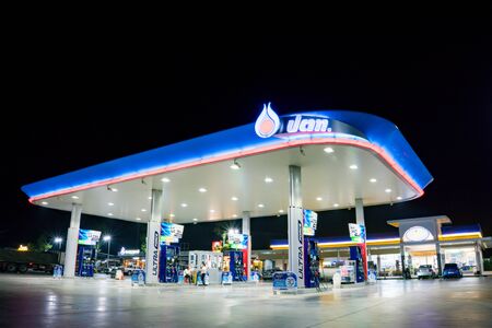 NAKHON PATHOM, THAILAND - FEB, 2018 :  the PTT fuel petrol station in the night sceneのeditorial素材
