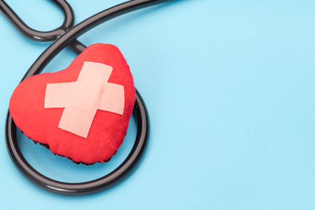 stethoscope and red heart symbol, healthcare and medicine, healthy and insurance, world health day conceptの写真素材
