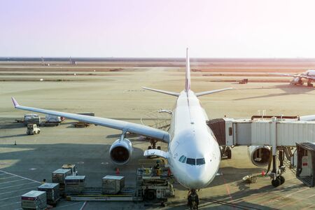 SHANGHAI, CHINA - FEB 2018: Loading cargo on the air freight logistics in airport, view through windowのeditorial素材