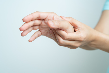 woman wrist arm pain. office syndrome healthcare and medicine conceptの写真素材