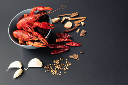 Crayfish red, Baby Lobster with herb for stir fry on black backgroundの写真素材