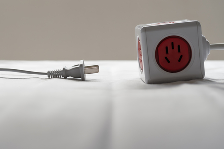 socket and plug electric power cube white color, save energy and reduce energy efficiency conceptの写真素材