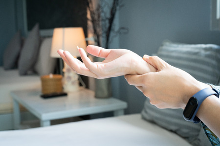 woman wrist arm pain. office syndrome healthcare and medicine conceptの写真素材