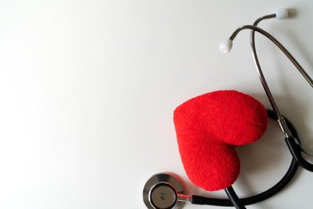 stethoscope with red heart on white background. Healthcare and medicine conceptの写真素材