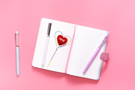 Valentine Day concept, Love daily with heart shape on pink backgroundの写真素材