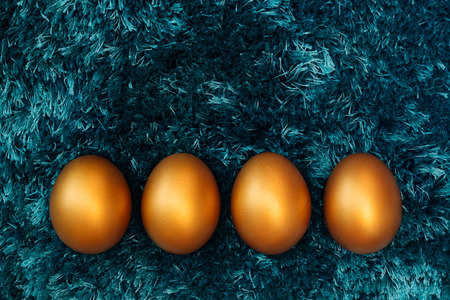 Golden Easter egg, happy Easter sunday hunt holiday decorationsの写真素材