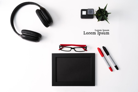 Mockup, Photo Frame, Action camera, Headphones, Glasses, Pen, and Cactus, Red and Black object on white backgroundの写真素材