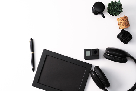 Mockup, Photo Frame, Action camera, Headphones, Pen, and Cactus, Black object on white backgroundの写真素材