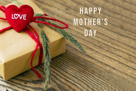 Happy Mothers Day, Heart shape with LOVE word, Gift box and flowerの写真素材