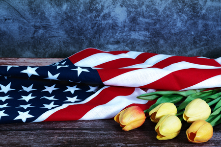 Memorial Day with American flag and flower on wooden backgroundの写真素材