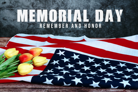 Memorial Day with American flag and flower on wooden backgroundの写真素材