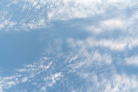 white soft cloud texture on blue sky backdropの写真素材