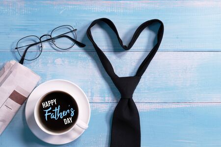 Happy Fathers Day,  necktie with a cup of coffee and eyeglassesの写真素材
