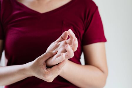 woman wrist arm pain long working. office syndrome healthcare and medicine conceptの写真素材
