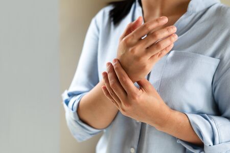 woman wrist arm pain long working. office syndrome healthcare and medicine conceptの写真素材