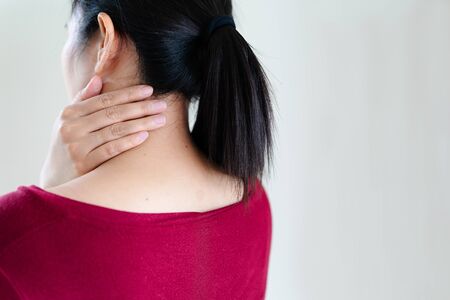young women neck and shoulder pain injury, healthcare and medical conceptの写真素材