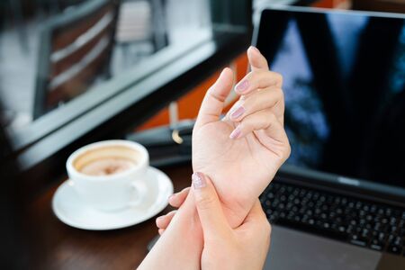 woman wrist hand arm pain long use mouse working. office syndrome healthcare and medicine conceptの写真素材