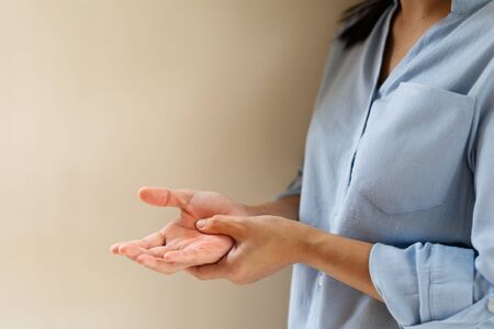 woman wrist arm pain long working. office syndrome healthcare and medicine conceptの写真素材